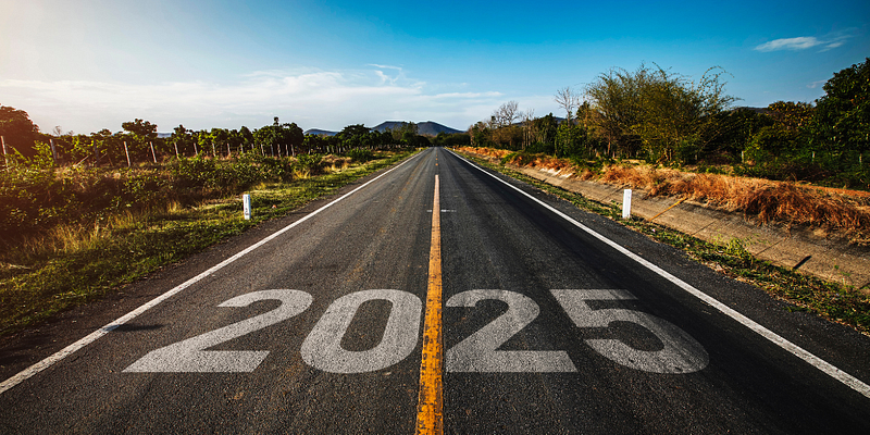 2025 written on a road leading into the distance